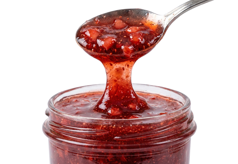 Fľaša kečupu a paradajky