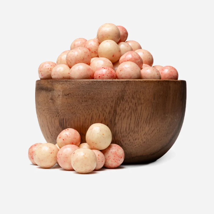 Chrumkavé guličky v bielej čokoláde s malinami